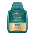 شامپو بیوکسین مدل کراتین و آرگان حجم 300 میل بدون سولفات و پارابن و ماده مضر برای موهای کراتین حاوی ماده موثر در ریزش های موهای کراتین شده حاوی کراتین و آرگان ترمیم کننده دارای امینو اسید تقویت و استحکام بخش مو مناسب انواع مو فاقد پارابن حاوی روغن آرگان حاوی ب کمپلکس B11 حاوی ویتامین های B1 B2 B5 B9 حجم : 300میل ساخت : ترکیه